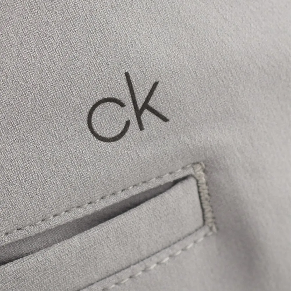Simple Mood RollUpFasten Calvin Klein Genius 4-Way Stretch Tapered Shorts - Silver
